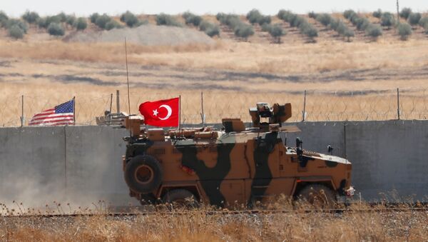 A Turkish military vehicle returns after a joint U.S.-Turkey patrol in northern Syria, as it is pictured from near the Turkish town of Akcakale, Turkey, September 8, 2019 - Sputnik International
