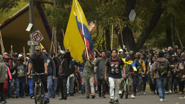 Protestors march in Quito on October 8, 2019 following days of protests against the sharp rise in fuel prices sparked by authorities' decision to scrap subsidies. - Sputnik International