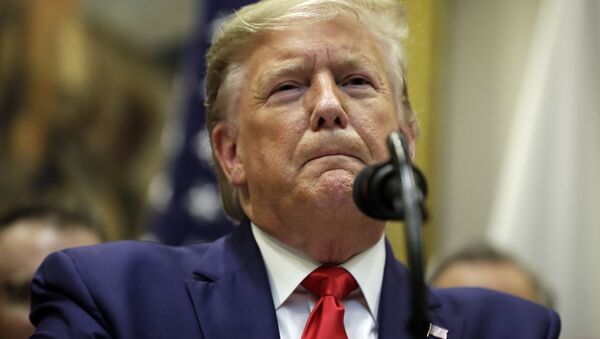 President Donald Trump listens to a question from the media as he speaks after a signing ceremony for a trade agreement with Japan in the Roosevelt Room of the White House, Monday, Oct. 7, 2019, in Washington - Sputnik International
