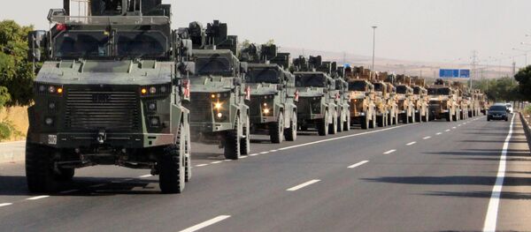 A Turkish miltary convoy is pictured in Kilis near the Turkish-Syrian border, Turkey, October 9, 2019 - Sputnik International