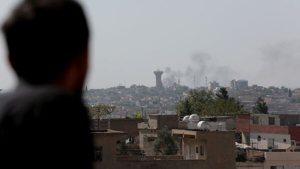 Tires are seen being burned in Syria's Qamishli  - Sputnik International
