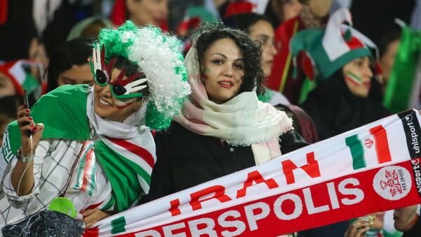 Iranian women pose for a picture during the World Cup Qatar 2022 Group C qualification football match between Iran and Cambodia at the Azadi stadium in the capital Tehran on October 10, 2019. - Sputnik International