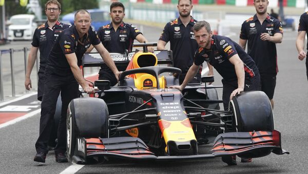 The car of Red Bull driver Max Verstappen of the Netherlands is pushed toward his garage at the Suzuka Circuit in Suzuka, central Japan - Sputnik International