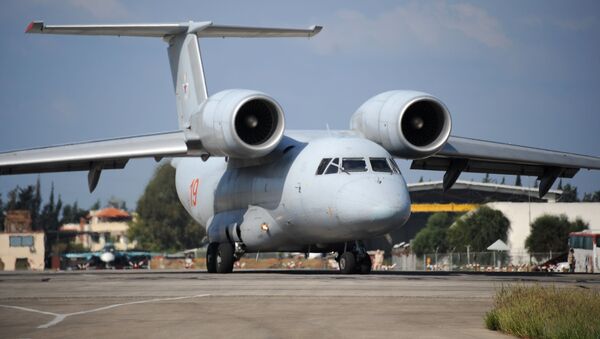 A Russian An-72 transport plane prepares to take off at the Russian military base of Hmeimim, located south-east of the city of Latakia in Hmeimim, Latakia Governorate, Syria, on September 26, 2019 - Sputnik International