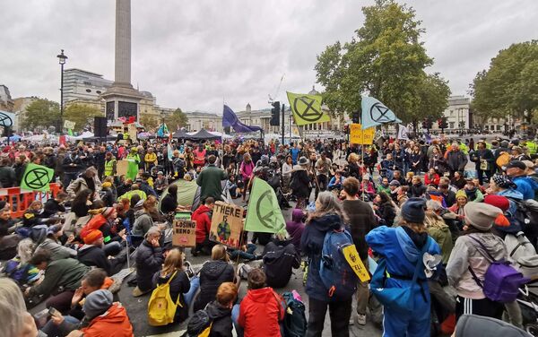 Extinction Rebellion activists block a major thruway to obstruct traffic during a major rally near Trafalgar Square in London, UK on Friday, 11 October 2019 - Sputnik International
