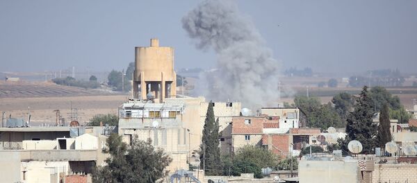 Fire engulfs border between Turkey and Syria amid battles between the Turkish Armed Forces and militants in the city of Ras al-Ayn. 12 October 2019 - Sputnik International