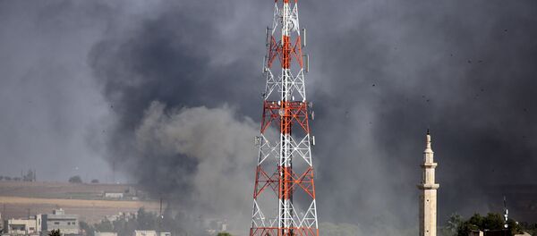 Fire engulfs border between Turkey and Syria amid battles between the Turkish Armed Forces and militants in the city of Ras al-Ayn. 12 October 2019 - Sputnik International