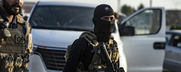 Members of the special forces of the Kurdish-led Syrian Democratic Forces (SDF) are pictured during preparations to join the front against Turkish forces, on October 10, 2019 Members of the special forces of the Kurdish-led Syrian Democratic Forces (SDF) are pictured during preparations to join the front against Turkish forces, on October 10, 2019 - Sputnik International