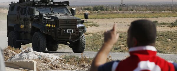 A Turkish police armoured vehicle patrols the border between Turkey and Syria, in Akcakale, Sanliurfa province, southeastern Turkey A Turkish police armoured vehicle patrols the border between Turkey and Syria, in Akcakale, Sanliurfa province, southeastern Turkey - Sputnik International