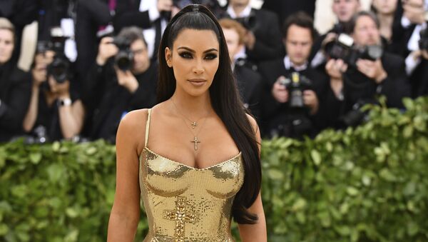 Kim Kardashian attends The Metropolitan Museum of Art's Costume Institute benefit gala celebrating the opening of the Heavenly Bodies: Fashion and the Catholic Imagination exhibition on Monday, May 7, 2018, in New York - Sputnik International
