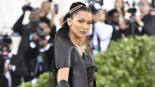 Bella Hadid attends The Metropolitan Museum of Art's Costume Institute benefit gala celebrating the opening of the Heavenly Bodies: Fashion and the Catholic Imagination exhibition on Monday, May 7, 2018, in New York.  - Sputnik International