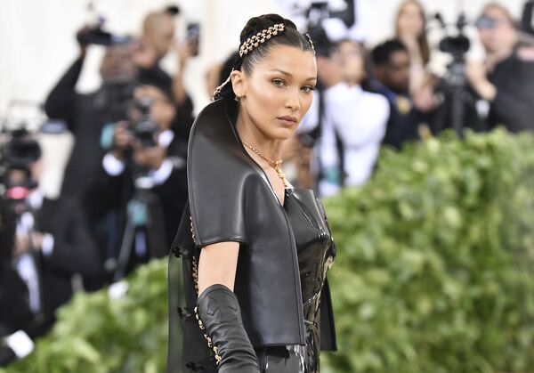 Bella Hadid attends The Metropolitan Museum of Art's Costume Institute benefit gala celebrating the opening of the Heavenly Bodies: Fashion and the Catholic Imagination exhibition on Monday, May 7, 2018, in New York.  - Sputnik International