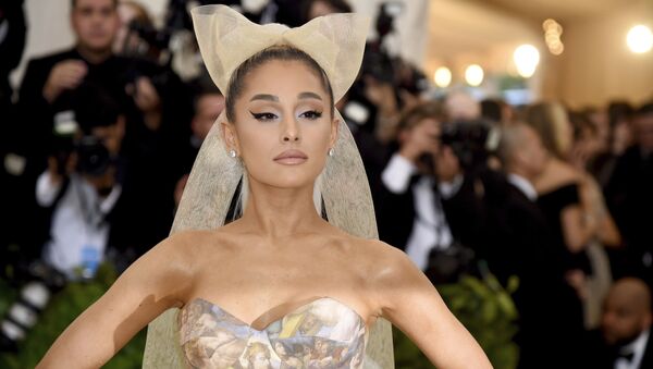 Ariana Grande attends The Metropolitan Museum of Art's Costume Institute benefit gala celebrating the opening of the Heavenly Bodies: Fashion and the Catholic Imagination exhibition on Monday, May 7, 2018, in New York.  - Sputnik International