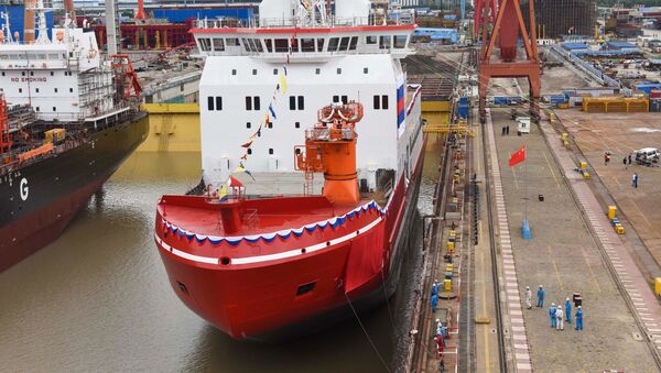 This photo taken on September 10, 2018 shows Xuelong 2, China's first domestically-built icebreaker, being launched at a shipyard in Shanghai - Sputnik International