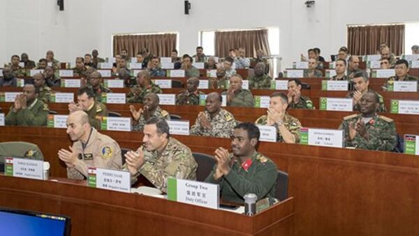 Foreign military officers attend a lecture at the International College of Defense Studies (ICDS) of the National Defense University of the People's Liberation Army - Sputnik International