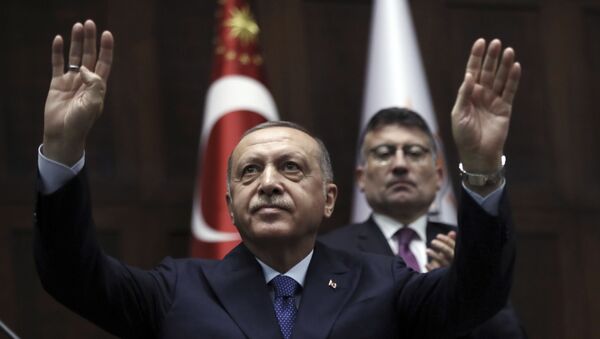 Turkish President Recep Tayyip Erdogan gestures as he addresses his ruling party legislators at the Parliament, in Ankara, Wednesday, Oct 16, 2019. - Sputnik International