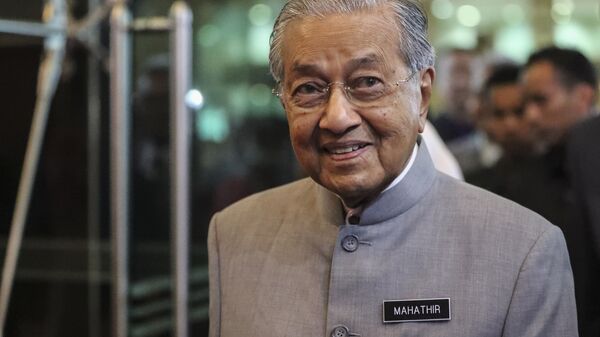 Malaysian Prime Minister Mahathir Mohamad arrives upon delivering a televised speech to the nation in conjunction with the coalition's first anniversary in power in Putrajaya, Malaysia, Thursday, May 9, 2019 - Sputnik International