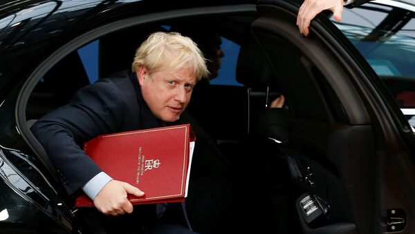 Britain's Prime Minister Boris Johnson arrives at the European Union leaders summit, in Brussels, Belgium October 17, 2019 - Sputnik International