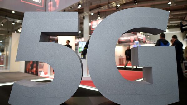 A logo of the upcoming mobile standard 5G is pictured at the Hanover trade fair, in Hanover, Germany March 31, 2019 - Sputnik International