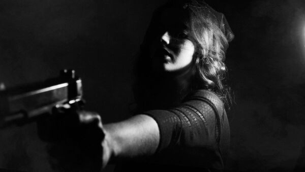  Woman with a gun - Sputnik International
