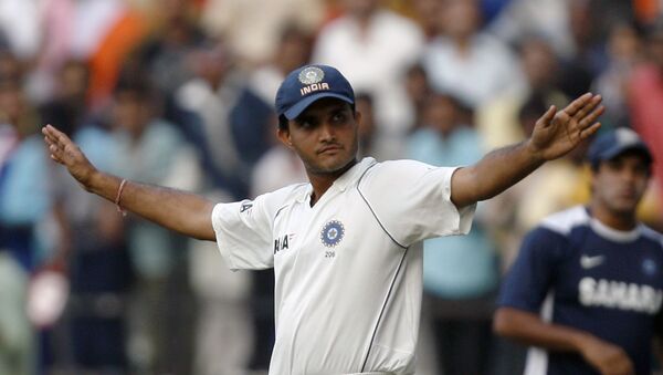 India's Saurav Ganguly gestures towards the crowd as he arrives on the ground for fielding during the fourth test cricket match against Australia in Nagpur November 9, 2008. Ganguly has announced his retirement after this test match. - Sputnik International