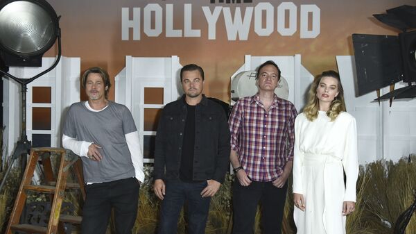 Brad Pitt, from left, Leonardo DiCaprio, Quentin Tarantino and Margot Robbie attend the photo call for Once Upon a Time in Hollywood at the Four Seasons Hotel on Thursday, July 11, 2019, in Los Angeles. (Photo by Jordan Strauss/Invision/AP) - Sputnik International