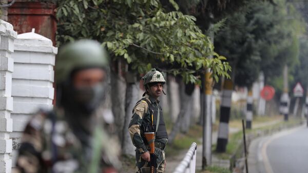 Indian Border Security Force soldiers guard outside the residence of former Chief Minister of Jammu and Kashmir and National Conference party president Farooq Abdullah before Abdullah met his party colleagues in Srinagar, Indian controlled Kashmir, Sunday, Oct. 6, 2019.  - Sputnik International