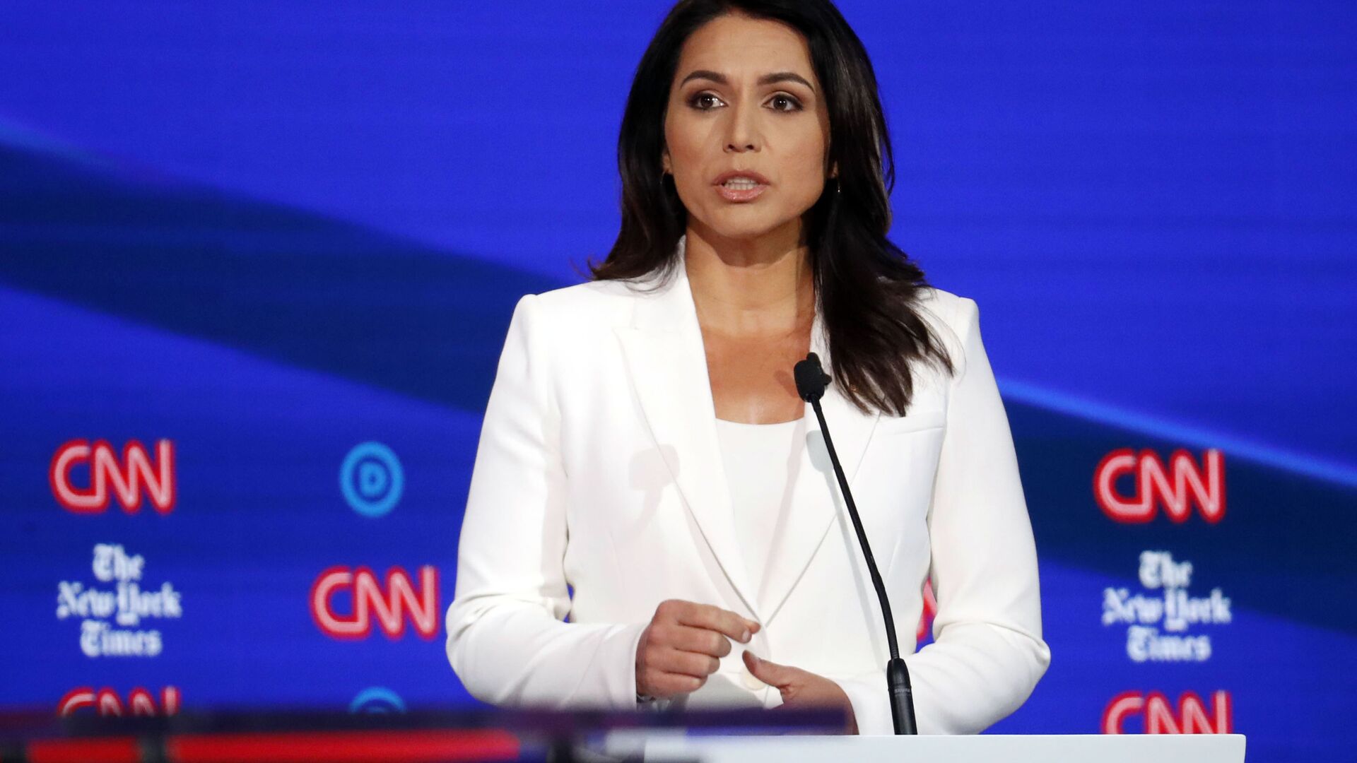Democratic presidential candidate Rep. Tulsi Gabbard, D-Hawaii, speaks during a Democratic presidential primary debate hosted by CNN/New York Times at Otterbein University, Tuesday, Oct. 15, 2019, in Westerville, Ohio - Sputnik International, 1920, 26.02.2022