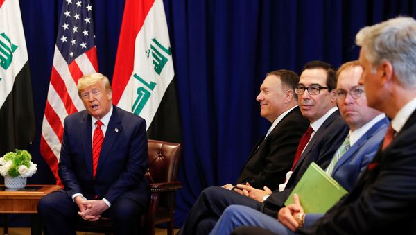 U.S. President Donald Trump speaks next to members of the U.S. delegation -- U.S. Secretary of State Mike Pompeo; Treasury Secretary Steve Mnuchin, Acting White House Chief of Staff Mick Mulvaney and National Security Advisor Robert O’Brien, during a bilateral meeting with Iraq's President Barham Salih on the sidelines of the annual United Nations General Assembly in New York City, New York, U.S., September 24, 2019 - Sputnik International