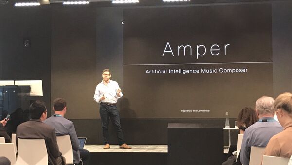 Drew Silverstein, the CEO and co-founder of Amper Music presents the app at Machines + Media - Sputnik International