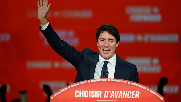 Liberal leader and Canadian Prime Minister Justin Trudeau waves on stage after the federal election at the Palais des Congres in Montreal, Quebec, Canada October 22, 2019.  - Sputnik International