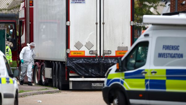 Police are seen at the scene where bodies were discovered in a lorry container, in Grays, Essex, Britain October 23, 2019 - Sputnik International