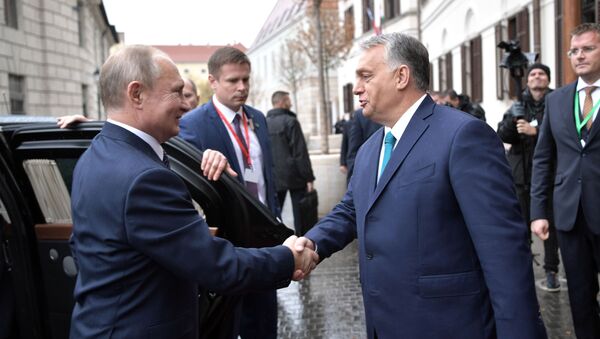 Russian President Vladimir Putin and Hungarian Prime Minister Viktor Orban - Sputnik International