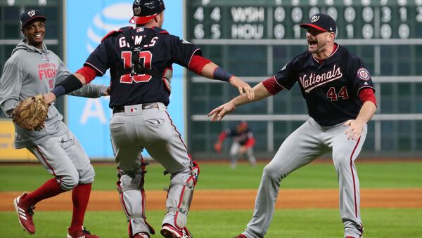 Washington Nationals celebrate after defeating the Houston Astros in game seven of the 2019 World Series at Minute Maid Park. - Sputnik International