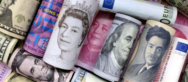 Euro, Hong Kong dollar, U.S. dollar, Japanese yen, pound and Chinese 100 yuan banknotes are seen in this picture illustration, January 21, 2016. Euro, Hong Kong dollar, U.S. dollar, Japanese yen, pound and Chinese 100 yuan banknotes are seen in this picture illustration, January 21, 2016. - Sputnik International