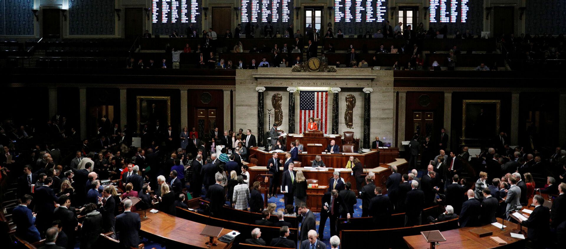 The votes of the members are displayed on an electronic tote board as the US House of Representatives cast their votes on a resolution that sets up the next steps in the impeachment inquiry of then-president Donald Trump on Capitol Hill in Washington, DC, 31 October 2019. REUTERS/Tom Brenner - Sputnik International, 1920, 17.02.2021