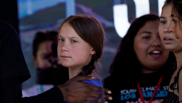 Swedish teen climate activist Greta Thunberg looks on during a march and rally at the Youth Climate Strike in Los Angeles, California, U.S., November 1, 2019. - Sputnik International