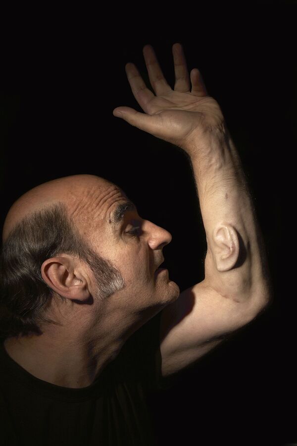 Australian performance artist Stelios Arcadiou, or Stelarc, who has a cell-cultivated ear surgically attached to his left arm - Sputnik International