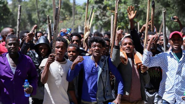 FILE PHOTO: Oromo youth chant slogans during a protest in-front of Jawar Mohammed's house, an Oromo activist and leader of the Oromo protest in Addis Ababa, Ethiopia, October 24, 2019 - Sputnik International