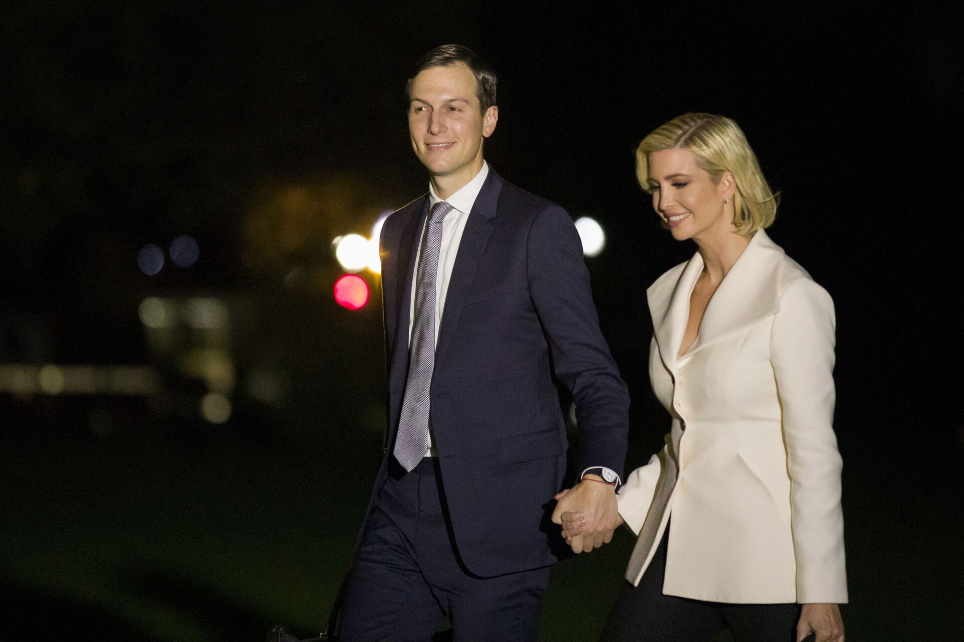 White House Senior Adviser Jared Kushner and his wife Ivanka Trump, the daughter and senior adviser to President Donald Trump, walk to the White House after stepping off Marine One on the South Lawn of the White House, early Friday, Oct. 18, 2019, in Washington. - Sputnik International, 1920, 07.09.2021