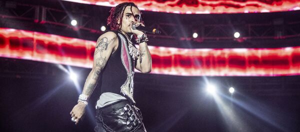 Lil Pump of Gucci Gang performs at the Coachella Music & Arts Festival at the Empire Polo Club on Sunday, April 14, 2019, in Indio, Calif. Lil Pump of Gucci Gang performs at the Coachella Music & Arts Festival at the Empire Polo Club on Sunday, April 14, 2019, in Indio, Calif. - Sputnik International