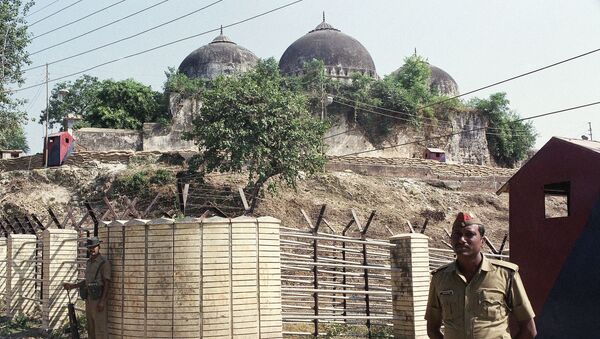 In this Oct. 29, 1990, file photo, Indian security officer guards the Babri Mosque in Ayodhya, closing off the disputed site claimed by Muslims and Hindus. - Sputnik International