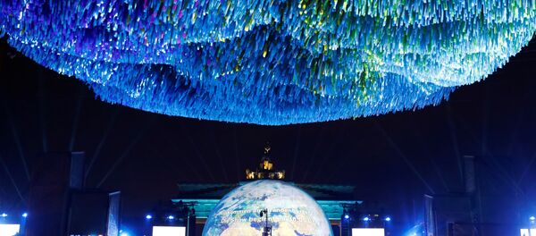 A general view shows the art installation Visions in Motion during a ceremony marking the 30th anniversary of the fall of the Berlin Wall at Brandenburg Gate in Berlin, Germany, November 9, 2019. - Sputnik International