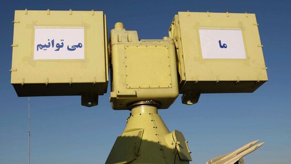 A picture shows a part of Iran's new medium range anti-aircraft air defence system Mersad (Ambush) and a Shahin (Hawk) medium range anti-aircraft missile (R) during a ceremony in Tehran on April 11, 2010 - Sputnik International