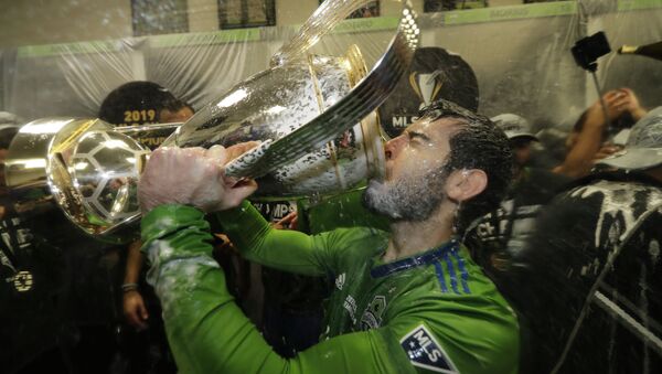Seattle Sounders' Victor Rodriguez, who scored a goal in the match, drinks from the cup Sunday, Nov. 10, 2019, after defeating Toronto FC in the MLS Cup championship soccer match in Seattle.  - Sputnik International