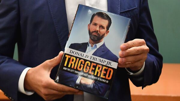 Donald Trump Jr., holds his new Book Triggered: How the Left Thrives on Hate and Wants to Silence Us at Barnes & Noble on 5th Avenue on November 5, 2019 in New York - Sputnik International