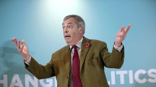 Brexit Party leader Nigel Farage gestures as he delivers a speech to supporters, during an event at the Washington Central Hotel, in Workington, England, Wednesday, Nov. 6, 2019 - Sputnik International