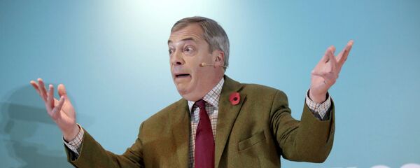 Brexit Party leader Nigel Farage gestures as he delivers a speech to supporters, during an event at the Washington Central Hotel, in Workington, England, Wednesday, Nov. 6, 2019 - Sputnik International