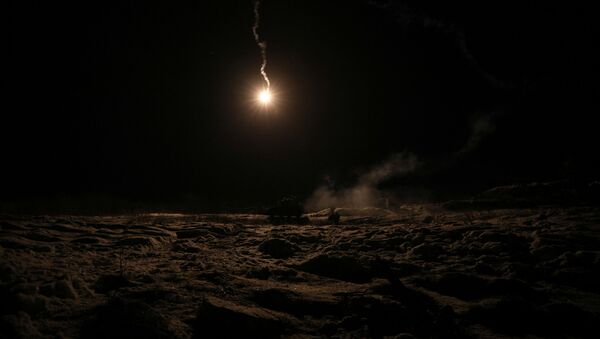 A lit flare streaks through the sky during a night exercise conducted by the Combat Support Squadron of the First Battalion of the Northern Brigade of the Norwegian Army during Reindeer 2, a Norwegian-U.S. military drill in Setermoen, Norway, October 30, 2019 - Sputnik International