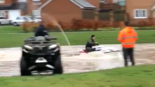 UK Man Makes the Most of Severe Flooding, Pulls Out Jet Ski - Sputnik International